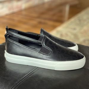 Calvin Klein black slip on sneakers